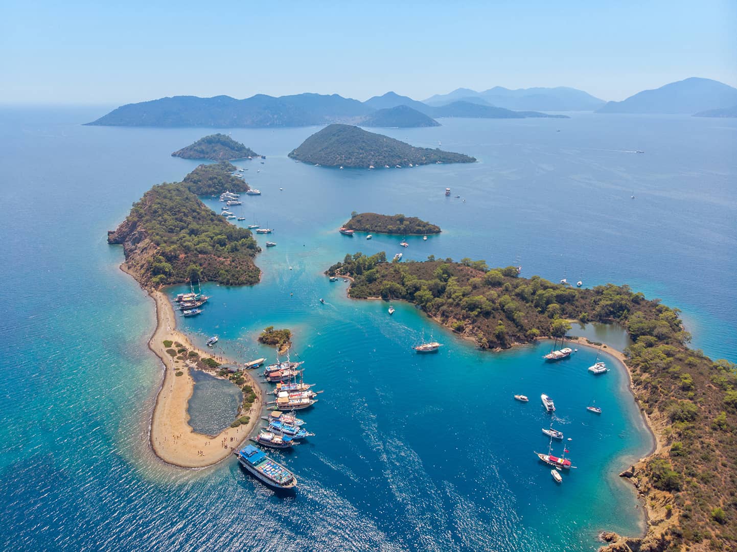 Turquoise bay and boats on the Fethiye coast
